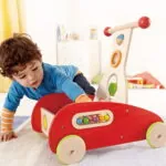 Jucarie din lemn - Antepremergator cu activitati rosu - Jucarii de impins si tras Hape 2
